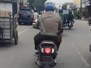 Polisi Naik Motor Tanpa Plat Nomor Viral di Media Sosial