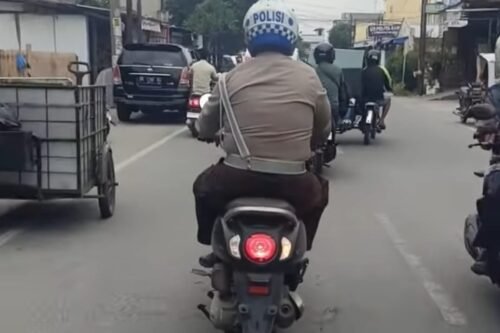 Polisi Naik Motor Tanpa Plat Nomor Viral di Media Sosial